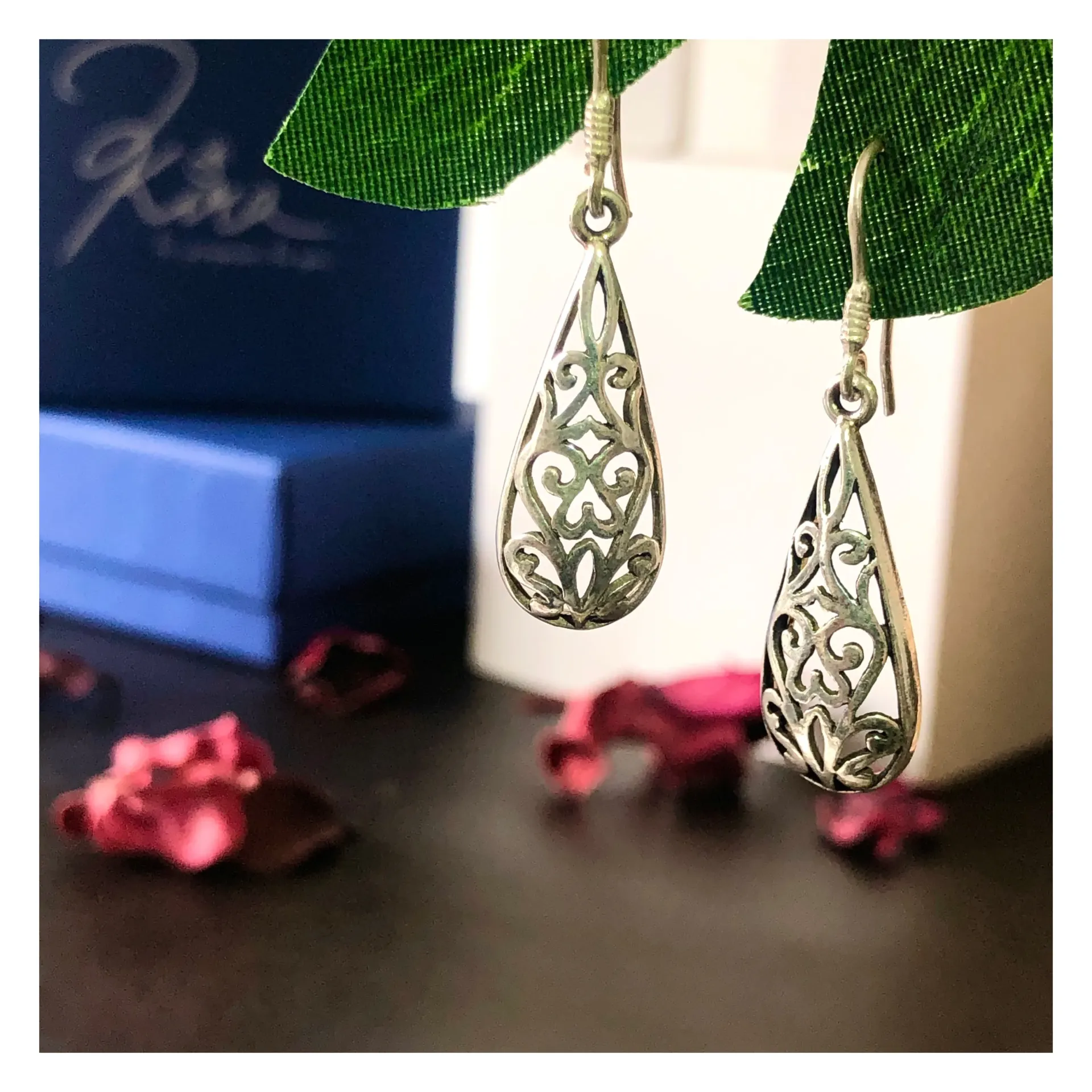 Silver Self design Earrings