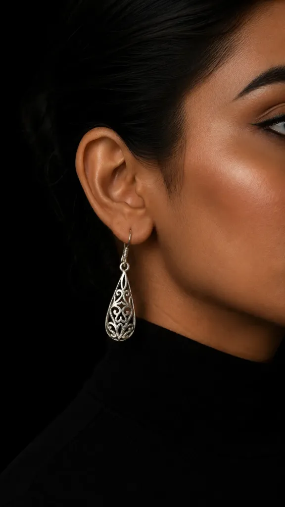 Silver Self design Earrings